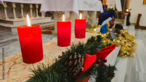 A traditional Christmas nativity scene (creche) and festive decorations 