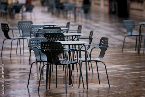 LONDON, UK. 15th  February 2025. Empty chairs on terrace at cafe.