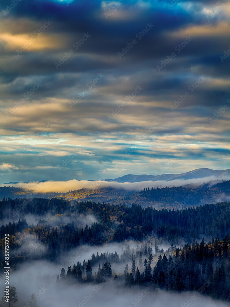 Fototapeta premium Sunny Autumn Carpathians with Puffy White During The Sunset