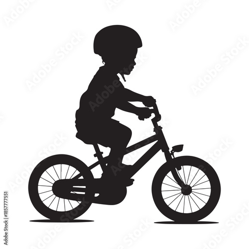 A silhouetted depiction of a young child confidently riding a bicycle with a helmet on