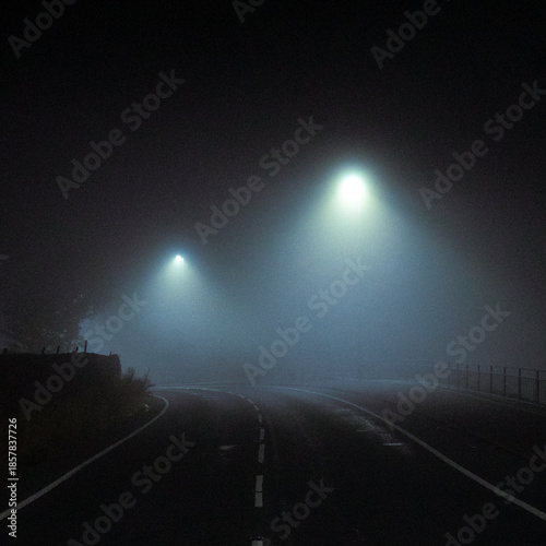 Street lamps on a foggy night