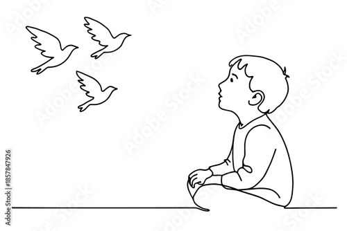 Young boy watches birds fly freely in the sky, a moment of wonder and imagination