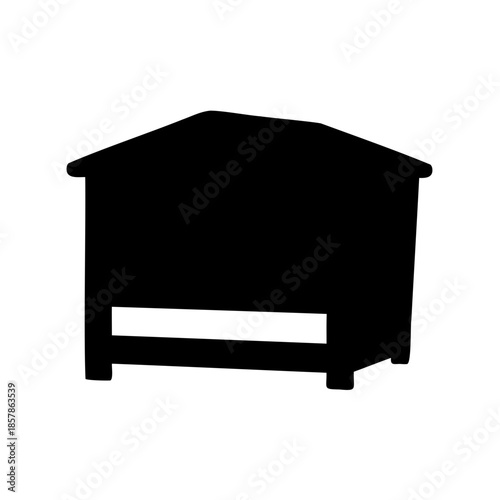 Silhouette of a small shed or animal shelter with roof overhang