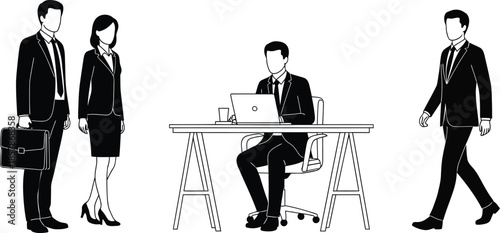 Business professionals in an office setting with a man working on a laptop