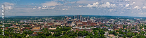 Birmingham Alabama cityscape day time with clouds blue sky