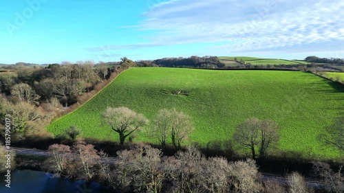 Dartington, South Devon, England: DRONE VIEWS: The drone flies over open countryside before traversing the River Dart. The River Dart originates on Dartmoor before ending its journey at Dartmouth.