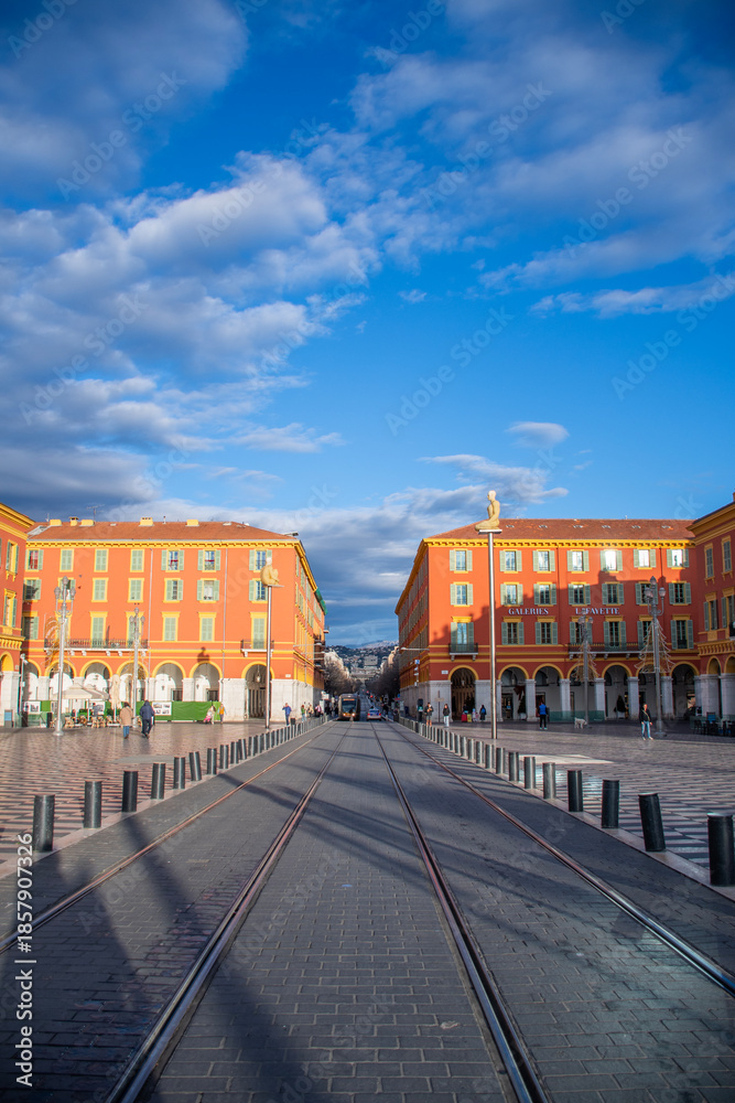 Obraz premium Nice, France - December - 26 - 2025: main avenue of the historic center of NICE with tram tracks in an empty open sky morning