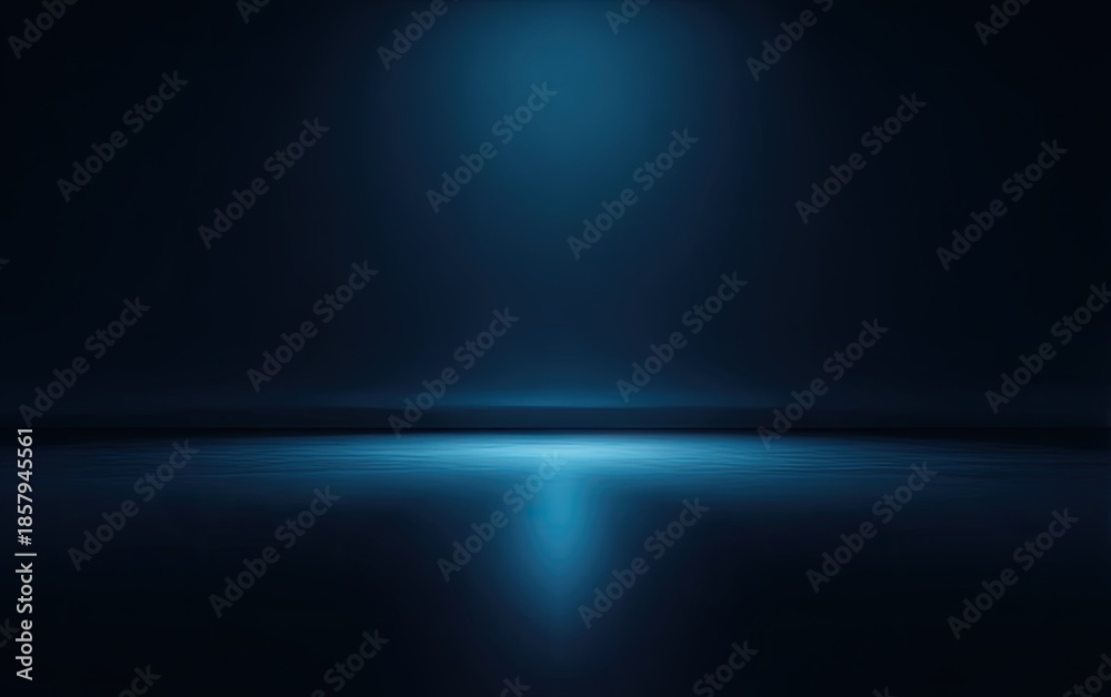 Obraz premium Dark room with single pool of soft, blue light reflecting on the floor
