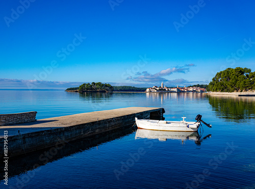 view of the old town of Rab from the nearby bay, winter, clear sky without clouds, Croatia, Mediterranean