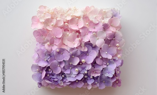 Delicate floral art piece.  Soft pinks and purples, hydrangeas and pearls