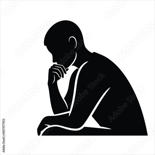 Man sitting and thinking with hand on chin