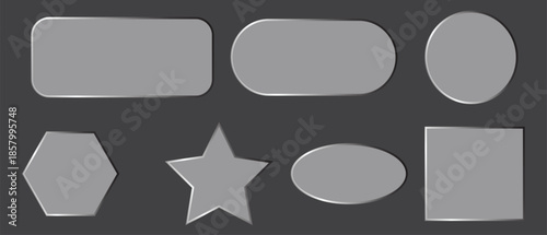 Collection of various gray geometric shapes on dark background