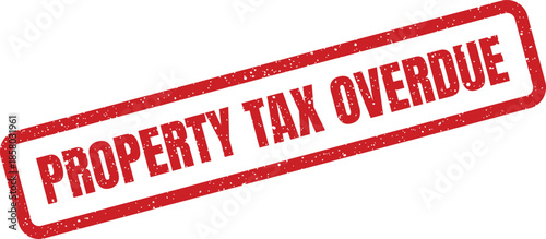 Distressed red rubber stamp impression indicating property tax is overdue with granular texture