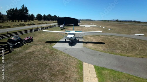 Small airplane starting engine with spinning propeller