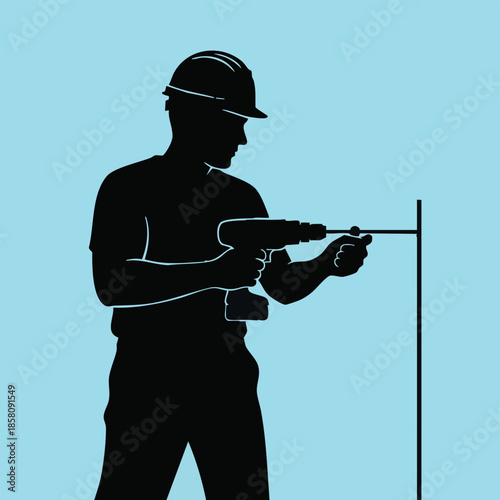 Construction worker drilling with power tool.