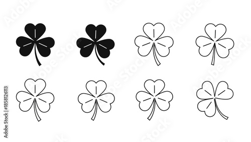 A collection of eight shamrock icons, with four solid black and four outlined, representing good luck and Irish heritage.