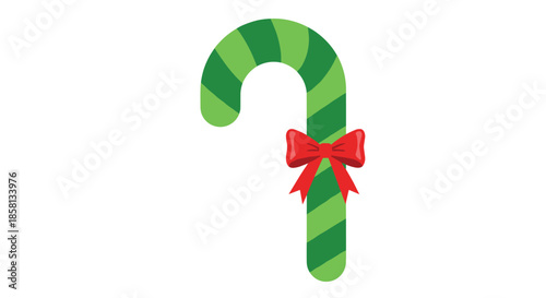 Green striped candy cane decorated with a bright red festive bow isolated on a white background for Christmas holiday celebrations.