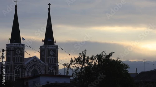 This waterfront video view in a riverside community in Chanthaburi shows the lights and houses along the water, as well as a Christian church – a beautiful tourist attraction in Thailand.