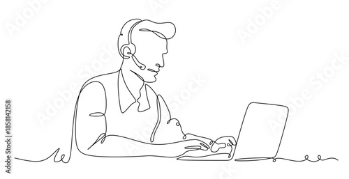 A man wearing a headset and using a laptop at a desk Working online, communicating, call center, customer service.