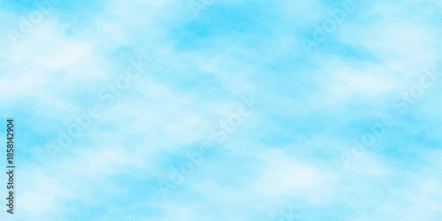 A beautiful clear blue sky background with fluffy white cumulus clouds on a bright sunny summer day creates a natural atmosphere and scenic cloudscape in the light of the open air