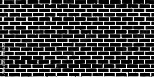 A seamless black and white brick wall pattern repetitive and textured