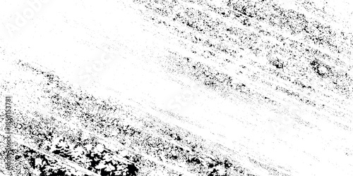 Abstract black and white texture with scattered grepsny patterns and diagonal linear markings creates a distressed visual effect