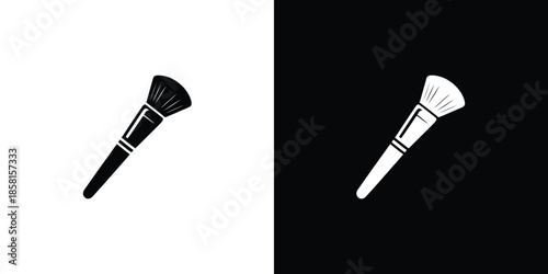 A pair of cosmetic brushes displayed in sleek black on white and white on black designs