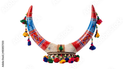 Traditional decorated cow horn with colorful paint and tassels isolated on white background for tribal culture design