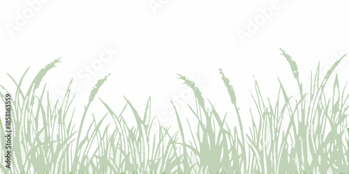 A simple illustration of light green grass blades against a white background