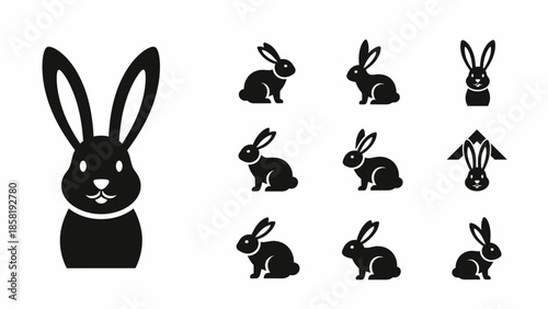 Black silhouettes of multiple rabbits together.