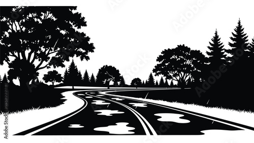 A winding road leading through a silhouetted landscape with trees