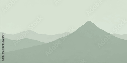 A misty mountain landscape at sunrise features jagged peaks rising above a fog-filled valley under a glowing orange sky with soft clouds and forest silhouettes along the distant horizon