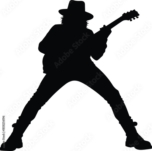 Silhouette of a rock musician playing guitar in a theatrical stance