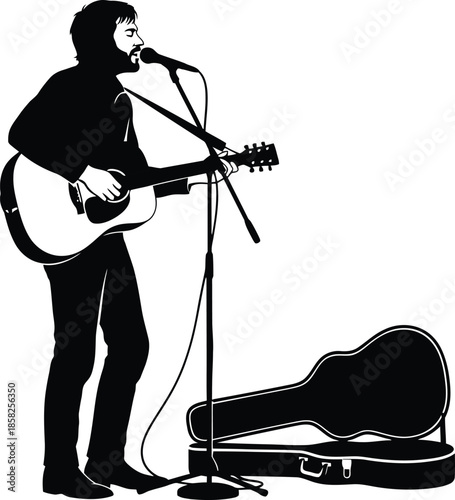 A musician performing on stage with guitar and microphone