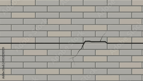 Damaged brick wall with a large crack showing the effect of structural damage