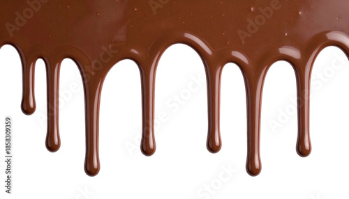 Close-up of glossy, flowing, dark chocolate drips against a black background