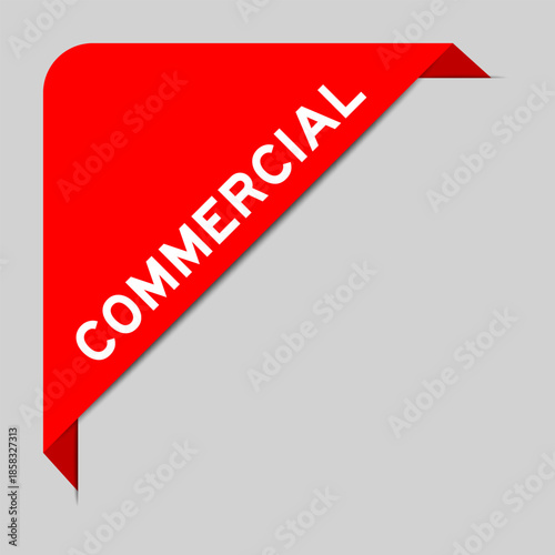 Red color of corner label banner with word commercial on gray background