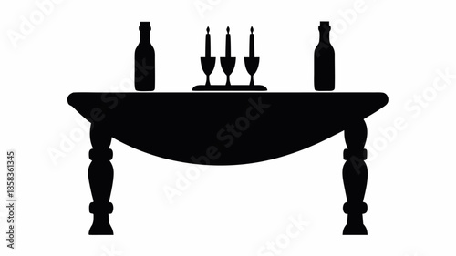 Elegant dinner table setup with wine and candles