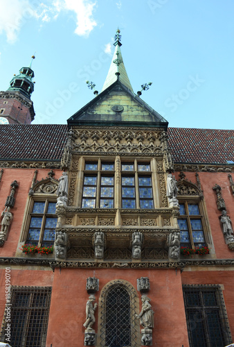 Gothic Spire and Ornate Bay Window of Wrocław Town Hall 