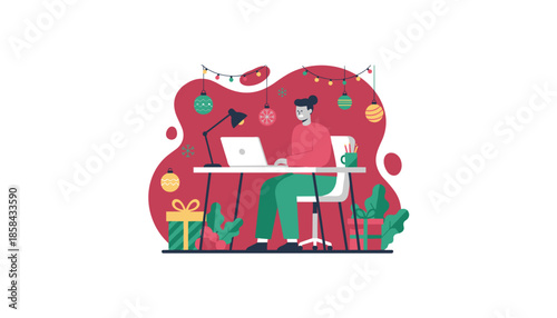 Young professional working on laptop at a desk decorated for Christmas Remote holiday business concept