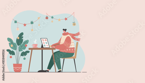 Festive person using tablet for online shopping or remote work in a cozy winter setting