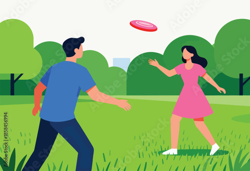 A man and woman play frisbee in a green park with trees