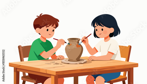Children painting a clay pot on a wooden table with brushes