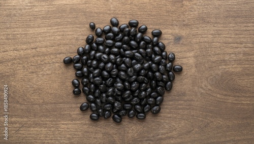 Top-down perspective of raw black beans, highlighting plant-based protein sources for nutritious diets, National Nutrition Month