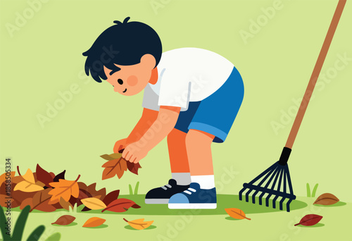 Young child raking a pile of fallen autumn leaves on a grassy lawn