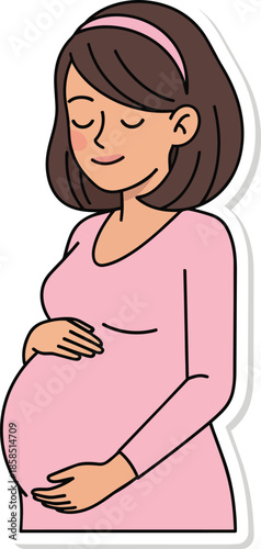 A pregnant woman in a pink dress smiling and holding her belly with love and care.