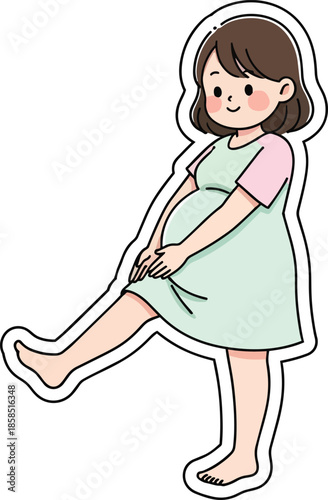 Pregnant woman stretching her leg and smiling while holding her belly in a green dress.