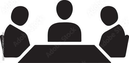 Three people sitting at a table in a meeting