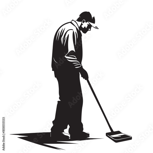 silhouette of a man with mop