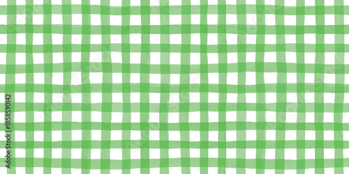 Seamless hand painted green gingham check pattern with soft watercolor texture. Warm cheerful plaid background ideal for fabric, wallpaper, packaging, stationery, kitchen and summer designs
